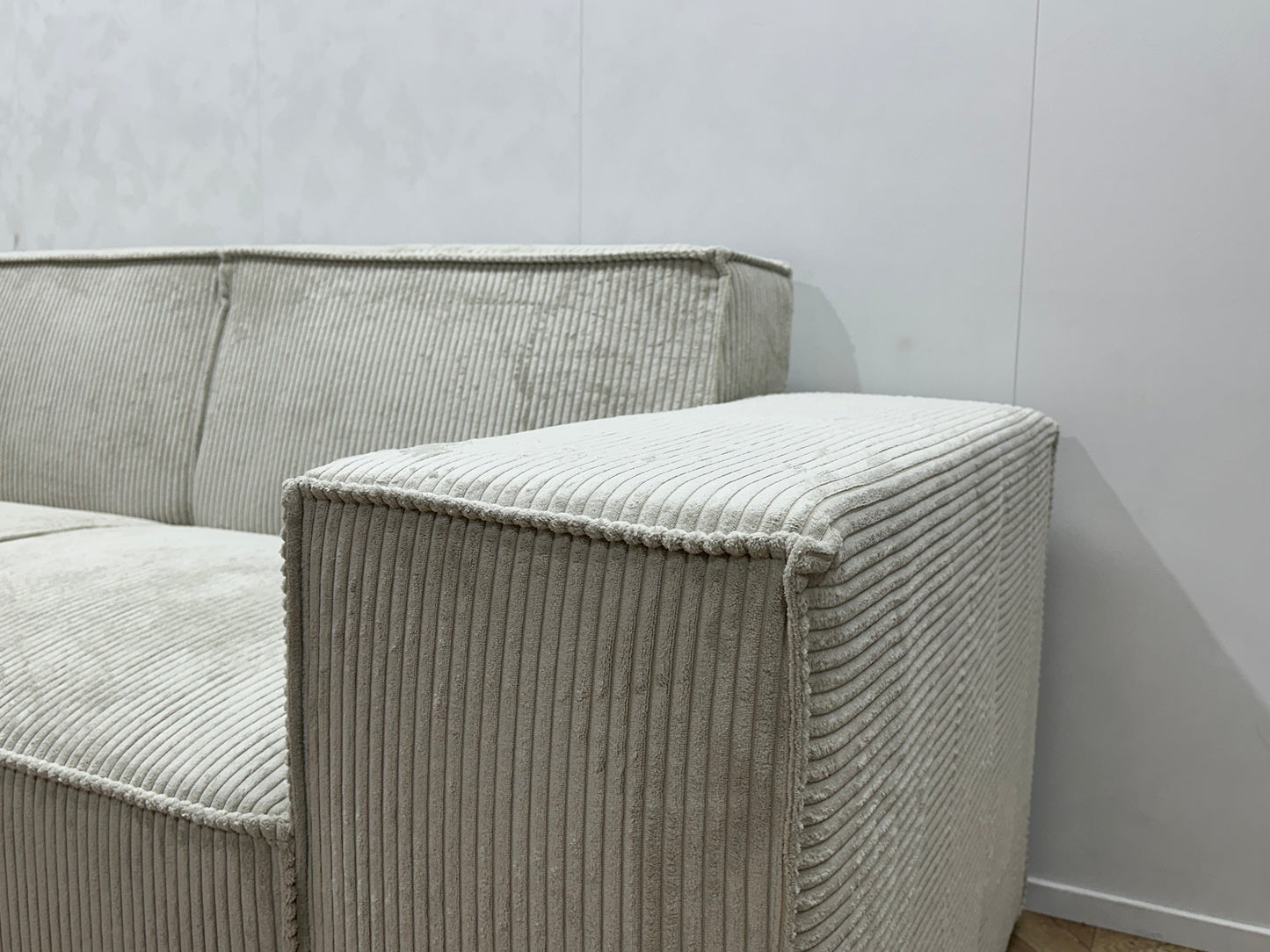 !Showroommodel! Witte Ribstof Hoekbank