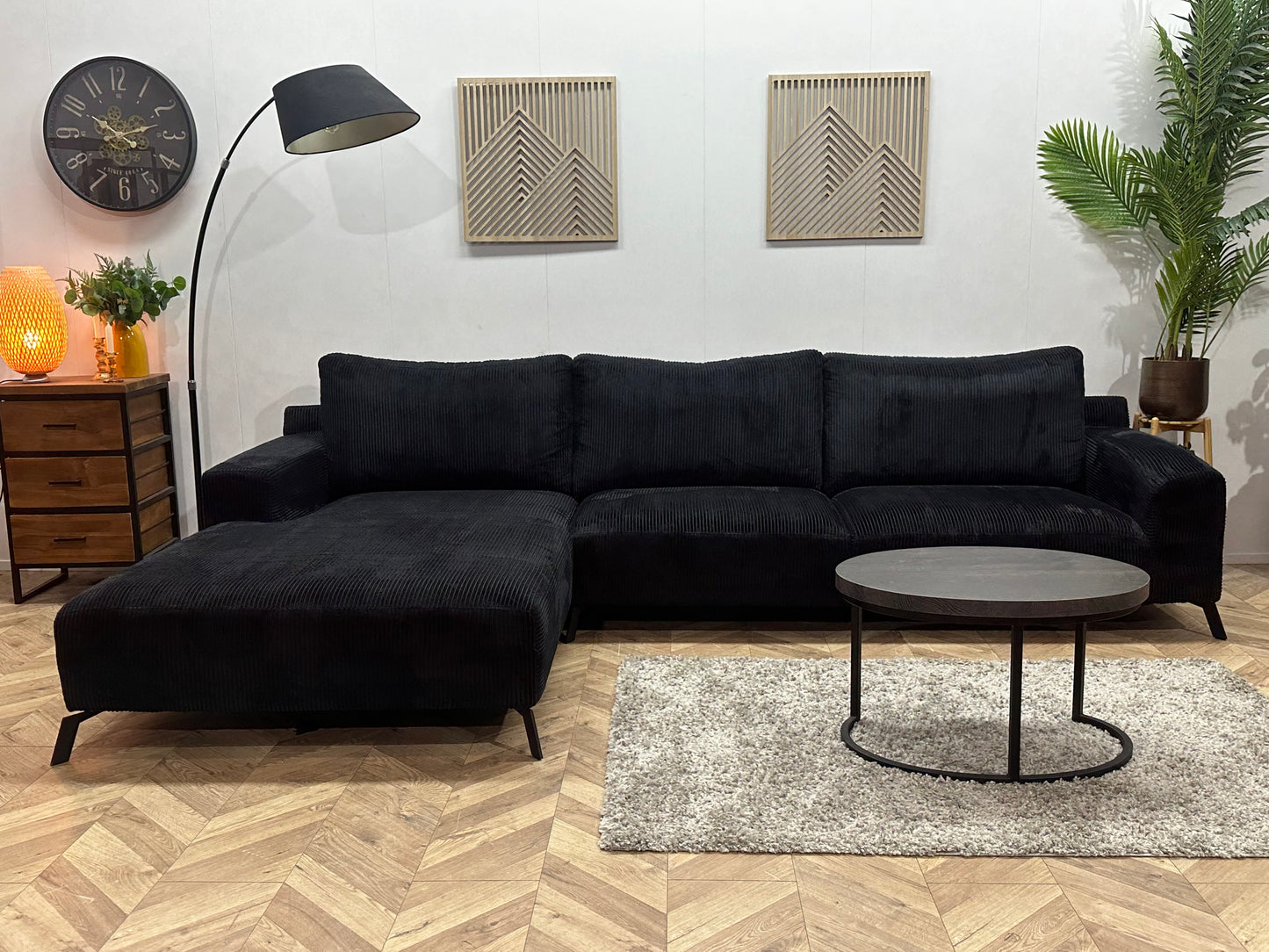 Zwarte Ribstof Hoekbank ~ Losse Rugkussens Met Afneembare Hoezen